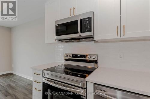 411 - 480 Gordon Krantz Avenue, Milton, ON - Indoor Photo Showing Kitchen With Upgraded Kitchen