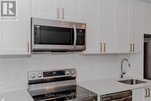 411 - 480 Gordon Krantz Avenue, Milton, ON - Indoor Photo Showing Kitchen With Stainless Steel Kitchen With Upgraded Kitchen