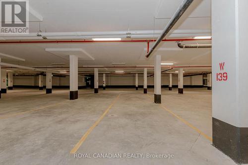 411 - 480 Gordon Krantz Avenue, Milton, ON - Indoor Photo Showing Garage