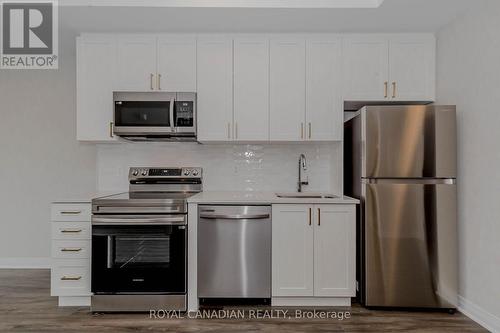 411 - 480 Gordon Krantz Avenue, Milton, ON - Indoor Photo Showing Kitchen With Stainless Steel Kitchen With Upgraded Kitchen