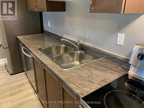 110 - 299 Cundles Road E, Barrie, ON - Indoor Photo Showing Kitchen With Double Sink