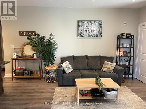 110 - 299 Cundles Road E, Barrie, ON - Indoor Photo Showing Living Room