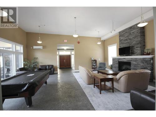 3313 Wilson Street Unit# 205, Penticton, BC - Indoor Photo Showing Other Room With Fireplace