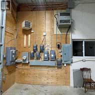 Utility room featuring electric panel - 