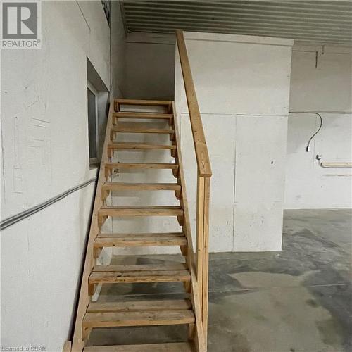 Stairs featuring concrete flooring - 5819 Wellington Cty Rd 7, Guelph, ON 