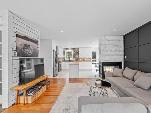 Overall view - 200 Rue Dessureault, Mont-Tremblant, QC - Indoor Photo Showing Living Room With Fireplace