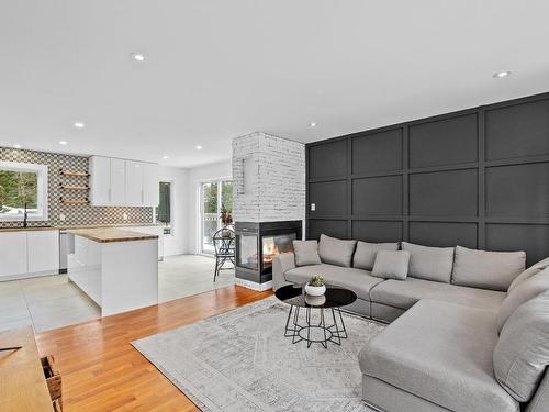 Living room - 200 Rue Dessureault, Mont-Tremblant, QC - Indoor Photo Showing Other Room With Fireplace