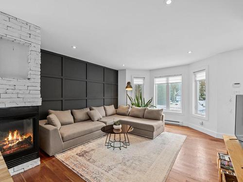 Living room - 200 Rue Dessureault, Mont-Tremblant, QC - Indoor Photo Showing Living Room With Fireplace