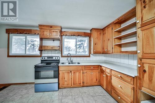 23 Hope Street N, Brighton, ON - Indoor Photo Showing Kitchen With Double Sink