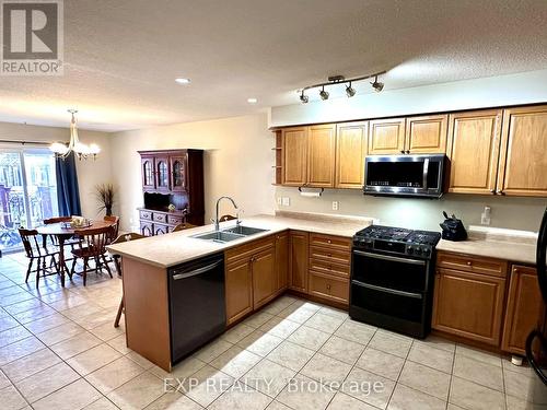 509 Alberta Avenue, Woodstock (Woodstock - South), ON - Indoor Photo Showing Kitchen With Double Sink