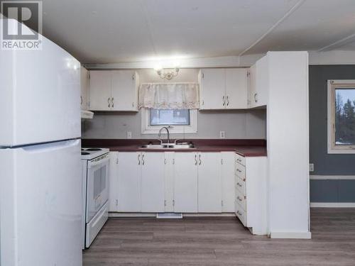 221-200 Lobird Road, Whitehorse, YT - Indoor Photo Showing Kitchen With Double Sink