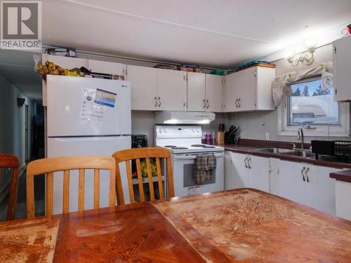 221-200 Lobird Road, Whitehorse, YT - Indoor Photo Showing Kitchen With Double Sink