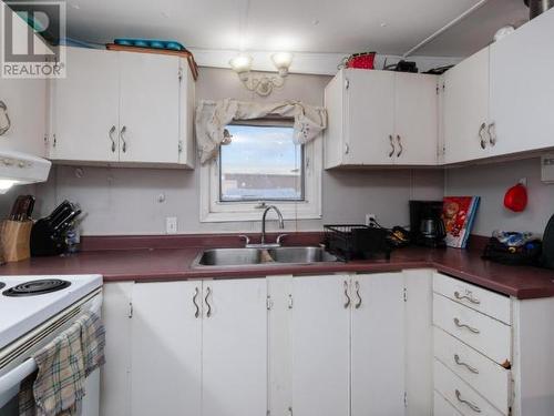 221-200 Lobird Road, Whitehorse, YT - Indoor Photo Showing Kitchen With Double Sink