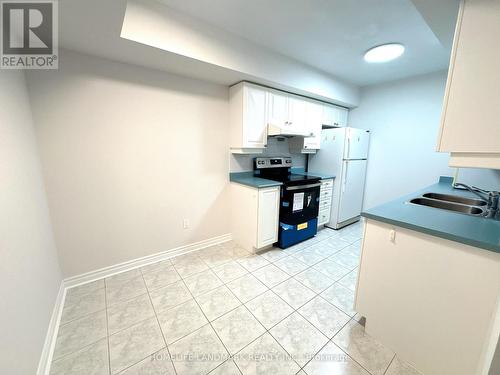 511 - 18 Sommerset Way, Toronto, ON - Indoor Photo Showing Kitchen With Double Sink