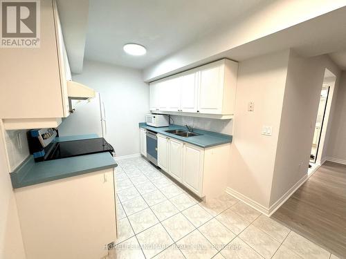 511 - 18 Sommerset Way, Toronto, ON - Indoor Photo Showing Kitchen With Double Sink