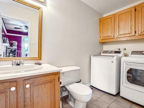 Powder room - 81 Rue Robert, Mont-Saint-Grégoire, QC - Indoor Photo Showing Laundry Room