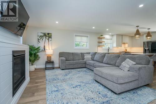 11 Eilber Street, Lambton Shores (Grand Bend), ON - Indoor Photo Showing Living Room With Fireplace