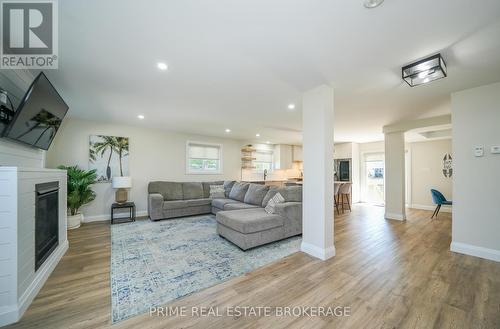 11 Eilber Street, Lambton Shores (Grand Bend), ON - Indoor Photo Showing Living Room With Fireplace