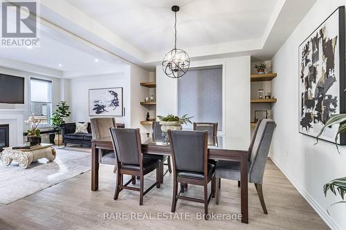 17 Herrick Drive, Brampton, ON - Indoor Photo Showing Dining Room With Fireplace