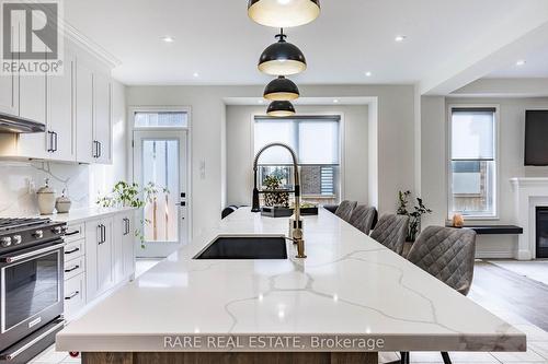 17 Herrick Drive, Brampton, ON - Indoor Photo Showing Kitchen With Fireplace With Upgraded Kitchen