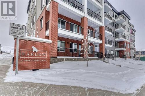 1208, 111 Wolf Creek Drive, Calgary, AB - Outdoor With Balcony With Facade