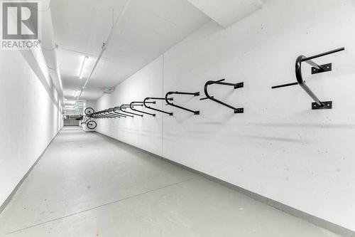 bike room in underground parking - 1208, 111 Wolf Creek Drive, Calgary, AB - Indoor