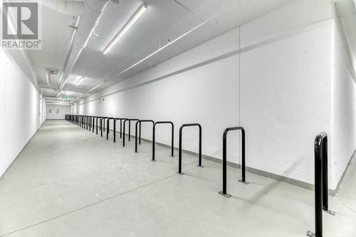 bike room in underground parking - 1208, 111 Wolf Creek Drive, Calgary, AB - Indoor Photo Showing Other Room