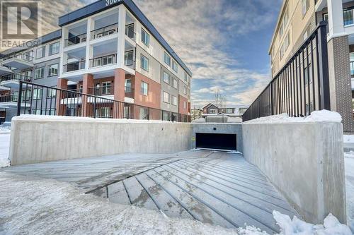 entrance to underground parking - 1208, 111 Wolf Creek Drive, Calgary, AB - Outdoor