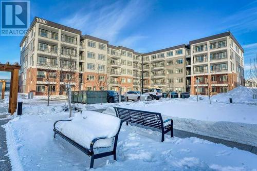 1208, 111 Wolf Creek Drive, Calgary, AB - Outdoor With Facade