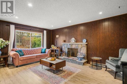 4 Chipstead Road, Toronto, ON - Indoor Photo Showing Living Room With Fireplace