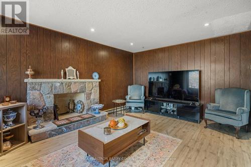 4 Chipstead Road, Toronto, ON - Indoor Photo Showing Living Room With Fireplace