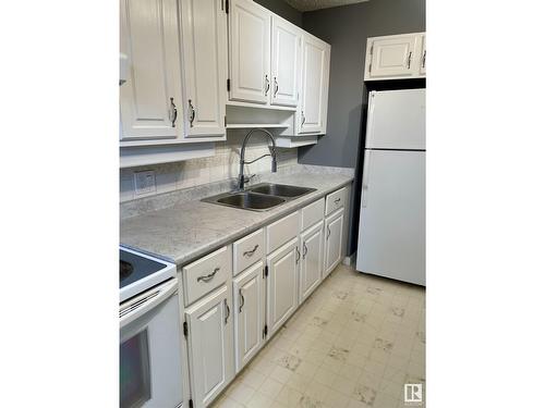 621 Millbourne Rd Nw, Edmonton, AB - Indoor Photo Showing Kitchen With Double Sink