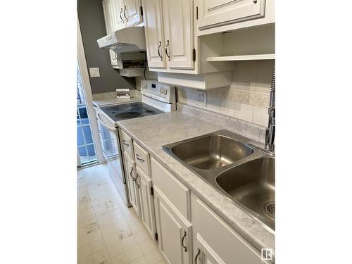 621 Millbourne Rd Nw, Edmonton, AB - Indoor Photo Showing Kitchen With Double Sink