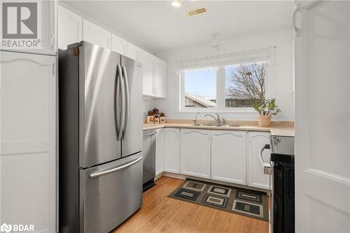 15 Aldersgate Drive Unit# 11, Belleville, ON - Indoor Photo Showing Kitchen With Double Sink