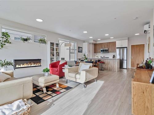 407-842 Orono Ave, Langford, BC - Indoor Photo Showing Living Room With Fireplace