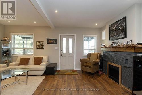 37 Seventeenth Street, Toronto, ON - Indoor Photo Showing Living Room With Fireplace