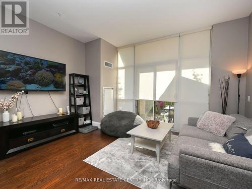 107 - 2480 Prince Michael Drive, Oakville, ON - Indoor Photo Showing Living Room