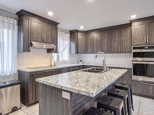 Cuisine - 880 Rg Du Bas-De-L'Assomption S., L'Assomption, QC - Indoor Photo Showing Kitchen With Double Sink With Upgraded Kitchen