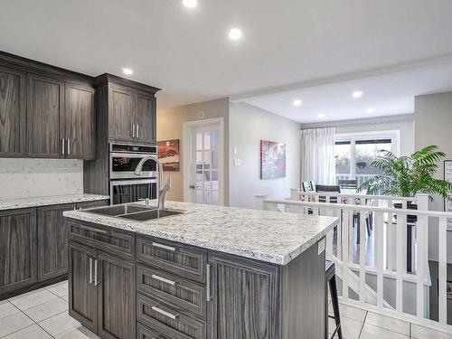 Cuisine - 880 Rg Du Bas-De-L'Assomption S., L'Assomption, QC - Indoor Photo Showing Kitchen With Double Sink