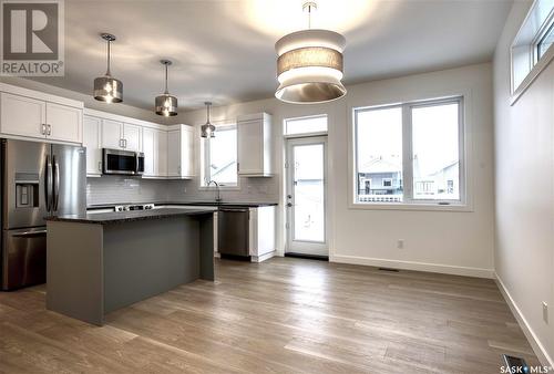 608 Weir Crescent, Warman, SK - Indoor Photo Showing Kitchen With Stainless Steel Kitchen With Upgraded Kitchen