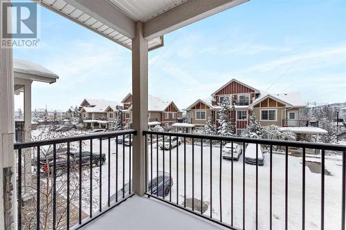 52 West Caoch Manor Sw, Calgary, AB - Outdoor With Balcony With Exterior