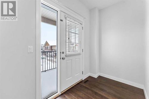 Balcony - 52 West Caoch Manor Sw, Calgary, AB - Indoor Photo Showing Other Room