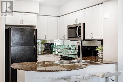 2308 - 4090 Living Arts Drive, Mississauga, ON - Indoor Photo Showing Kitchen With Double Sink