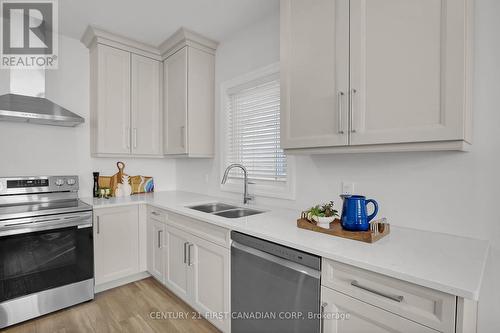 403 Breakwater Boulevard, Central Elgin, ON - Indoor Photo Showing Kitchen With Double Sink