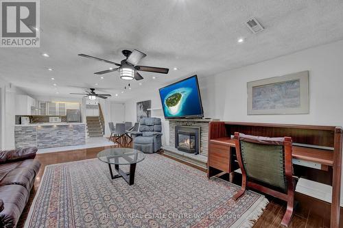 2477 Islington Avenue, Toronto, ON - Indoor Photo Showing Living Room With Fireplace