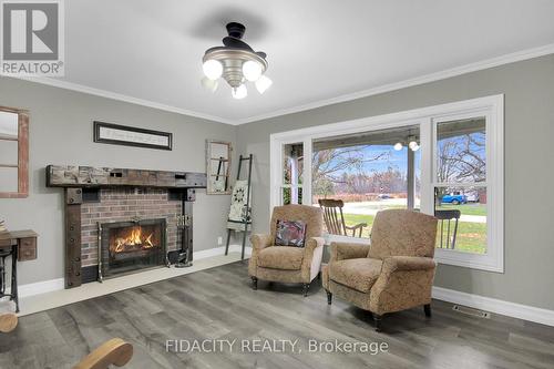 6657 Bluebird Street, Ottawa, ON - Indoor Photo Showing Living Room With Fireplace