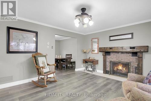 6657 Bluebird Street, Ottawa, ON - Indoor Photo Showing Living Room With Fireplace