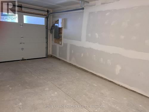 93 - 61 Soho Street, Hamilton, ON - Indoor Photo Showing Garage