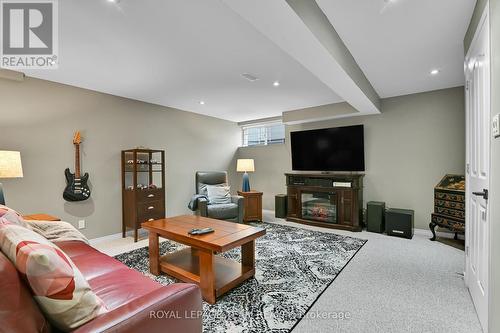 220 Allgrove Way, Ottawa, ON - Indoor Photo Showing Living Room With Fireplace