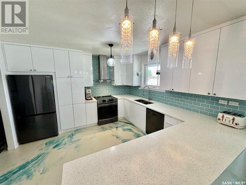 212 Taylor Avenue, Springside, SK - Indoor Photo Showing Kitchen With Double Sink